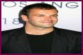 Jonny Lee Miller flashes ink for Ellen charity